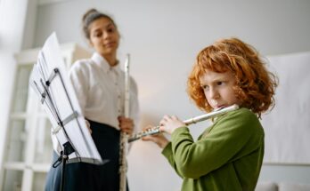 A flute player practicing in a music room