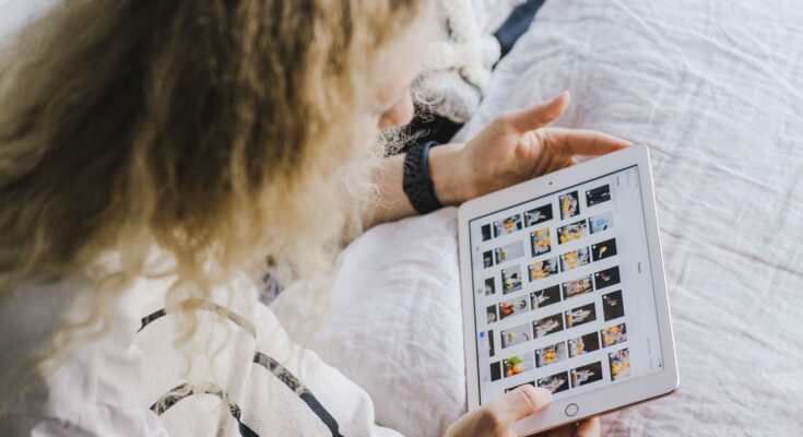 iPad Seniors Guide: An older adult learning how to use an iPad tablet comfortably.